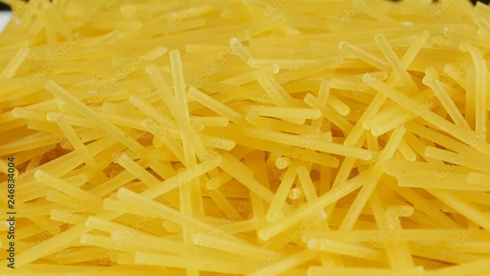 Spaghetti - yellow pasta, ready for cooking. Spaghetti - yellow pasta, ready for cooking.