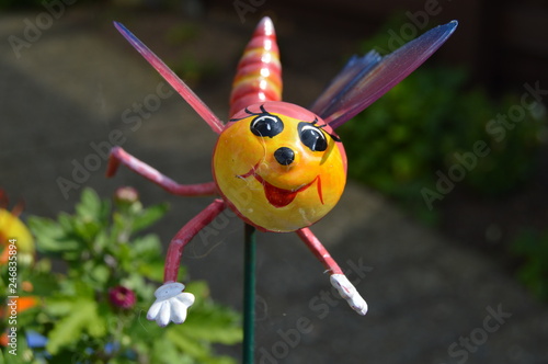 happy wasp garden ornament