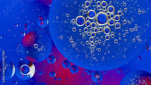 oil circles on the water, abstract space background,