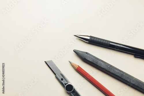 Pencils and penknife on drawing paper