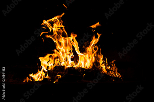 Fire flames burning isolated on black background. High resolution wood fire flames collection smoke texture background concept image.