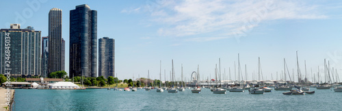 Panorama- Monroe harbor. A lot of boats and skyscrapers with blue sky and some clouds in Chicago harbors 