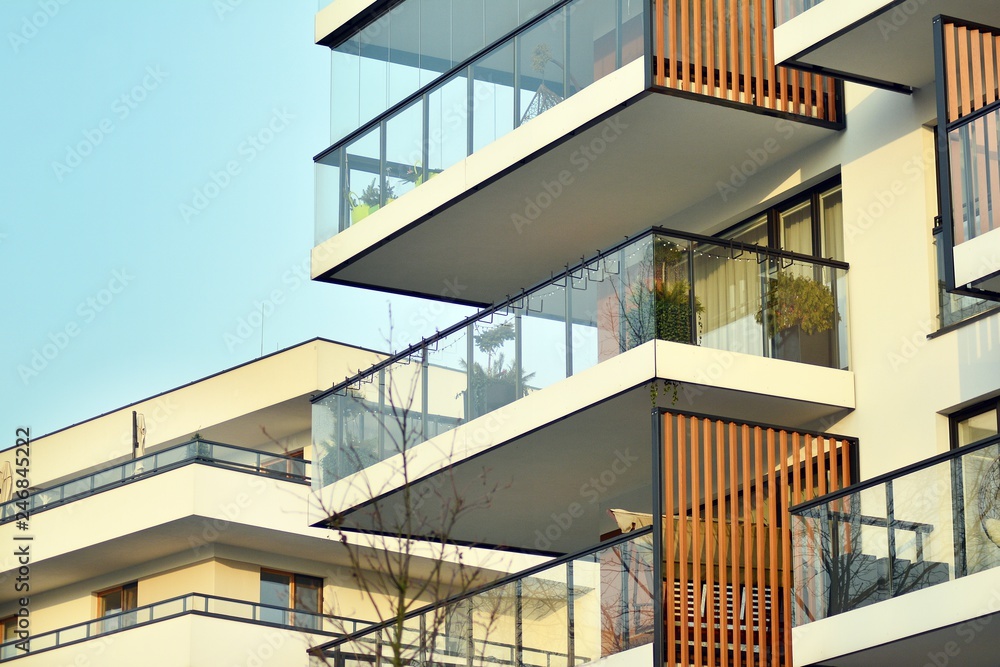 Fototapeta premium Abstract fragment of contemporary architecture, walls made of glass and concrete.