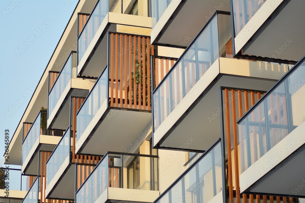 Fototapeta premium Abstract fragment of contemporary architecture, walls made of glass and concrete.