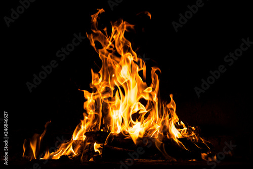 Fire flames burning isolated on black background. High resolution wood fire flames collection smoke texture background concept image. © Hakan Tanak