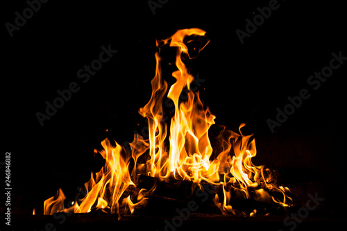 Fire flames burning isolated on black background. High resolution wood fire flames collection smoke texture background concept image. photo