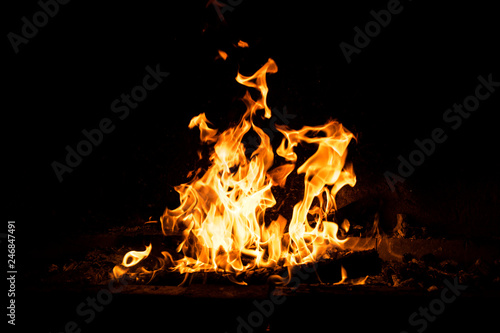 Fire flames burning isolated on black background. High resolution wood fire flames collection smoke texture background concept image.