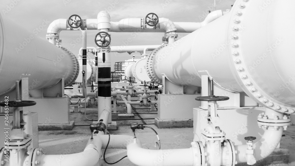 Heat exchangers in a refinery. The equipment for oil refining Heat exchangers in a refinery. The equipment for oil refining