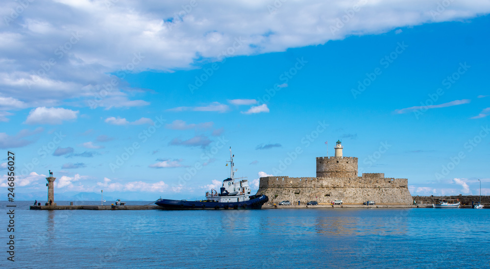 the watch of Rhodes marina Mandraki,the lighthouse of port