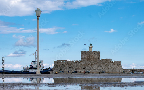 the watch of Rhodes marina Mandraki,the lighthouse of port