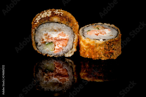Japanese national popular cuisine. Sushi, rice and fish. Tasty, beautifully served food in a restaurant, cafe, with elements of the original design © alphstudio
