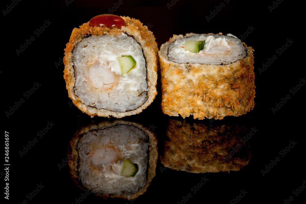 Japanese national popular cuisine. Sushi, rice and fish. Tasty, beautifully served food in a restaurant, cafe, with elements of the original design Japanese national popular cuisine. Sushi, rice and fish. Tasty, beautifully served food in a restaurant, cafe, with elements of the original design