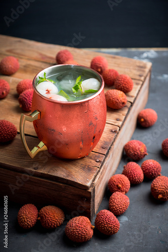 Photography Fresh lychee moscow mule on the rustic background