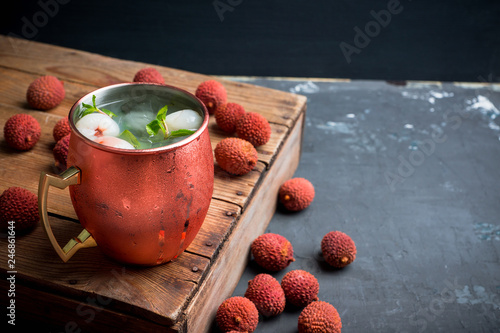 Photography Fresh lychee moscow mule on the rustic background