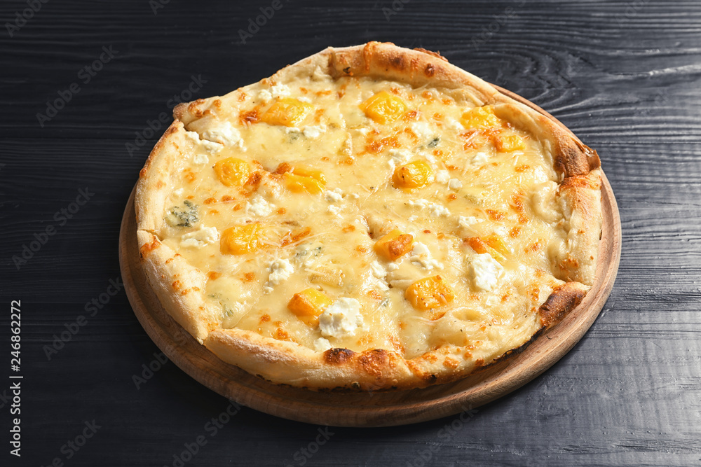 Hot cheese pizza Margherita on wooden table Hot cheese pizza Margherita on wooden table
