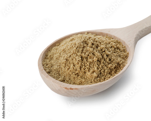 Spoon of pumpkin seed flour isolated on white © New Africa
