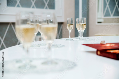 glasses of champagne on a white table