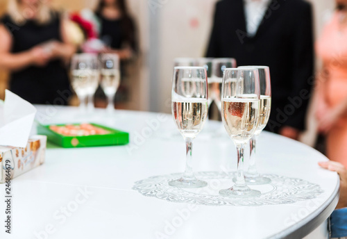 glasses of champagne on a white table