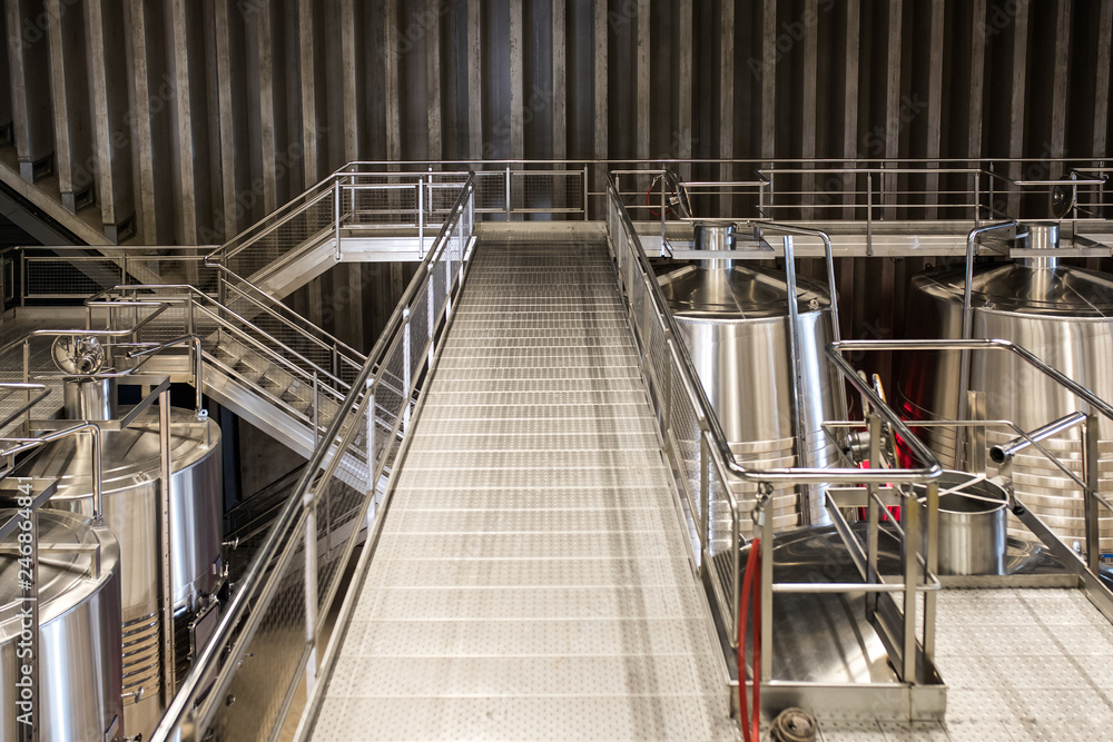 Fototapeta premium Modern winery with big steel barrels