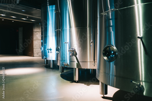 Billede på lærred Modern winery with big steel barrels
