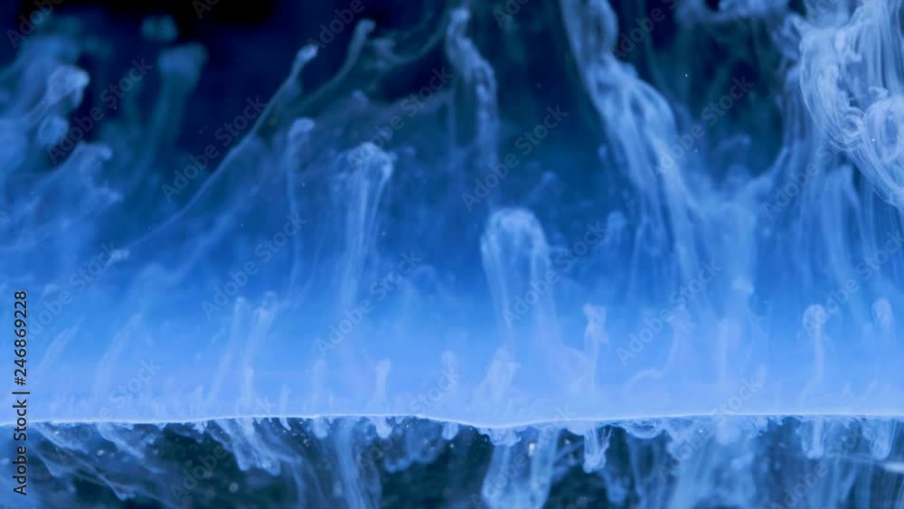 Blue ink paint background in the water Blue ink paint background in the water
