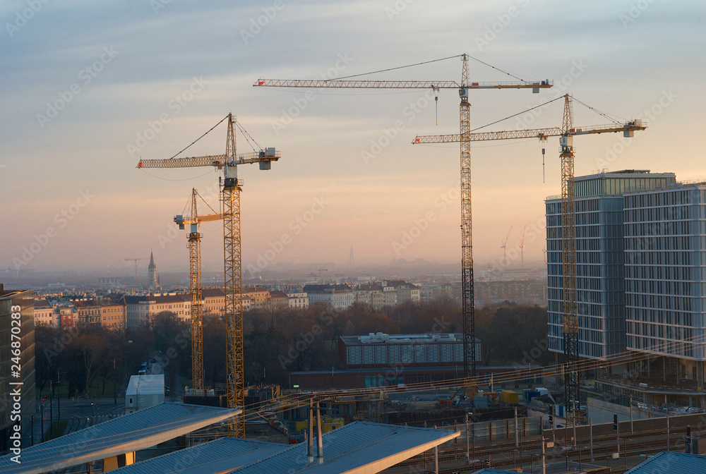 Construction Cranes in the Morning with the Skyline of Vienna