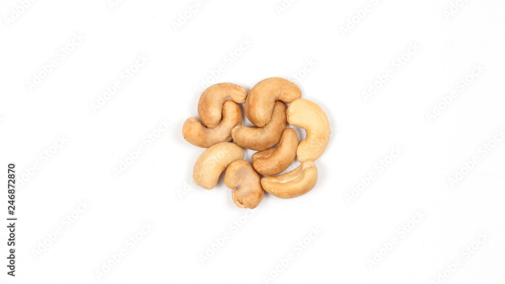 Cashews on a white background. Nuts lined in a circle. Cashews on a white background. Nuts lined in a circle.