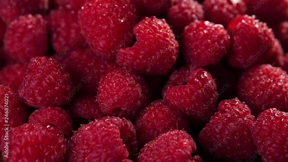 Heap of fresh raspberries rotating. Closeup macro shot. Fresh berry series. 4k. Heap of fresh raspberries rotating. Closeup macro shot. Fresh berry series. 4k.