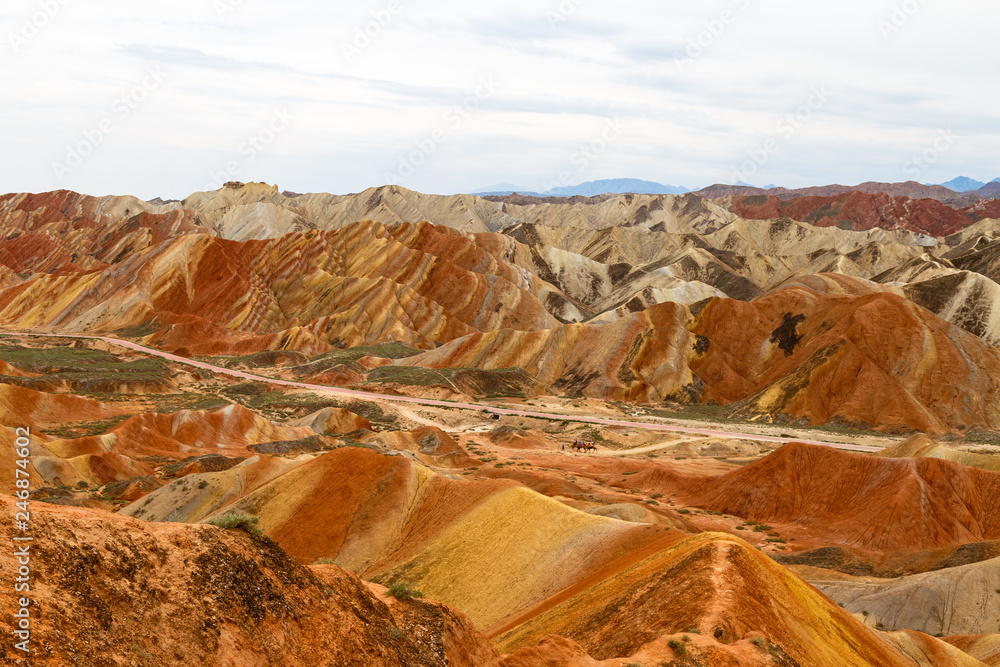 Danxia Feng, or Colored Rainbow Mountains, in Zhangye, Gansu, China. Here the view from the Colorful clouds observation deck