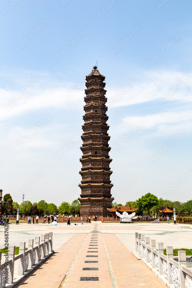 The Iron Pagoda of Kaifeng, Henan, China. Built in 1069 and 57m high, its glazed surface of Iron color features 1600 intricate and richly detailed carvings. Kaifeng is an ancient capital of China