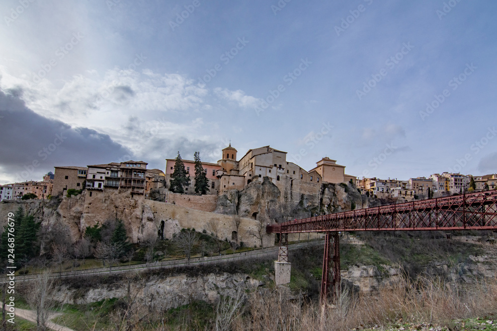 Cuenca , Spain; February 2017:  This view shows the Hanging Houses perched on the cliffside and Bridge of San Pablo, over the Huecar River 