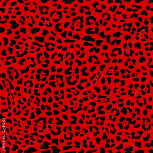 Seamless Faux Textured Jaguar Skin Pattern with black spots on bright red background. Vector EPS10 animal repeat surface pattern. Punk rock fashion pattern