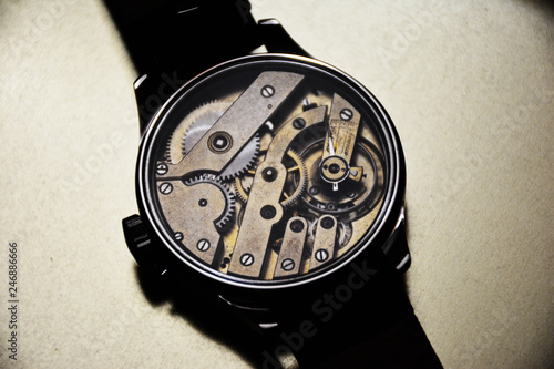 Beautiful handmade wristwatches on a golden background.