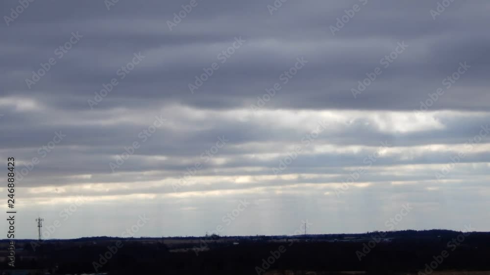 Timelapse Clouds With Sunrays In Morning And Telephone Tower In Distance Wider Angle Frame Timelapse Clouds With Sunrays In Morning And Telephone Tower In Distance Wider Angle Frame