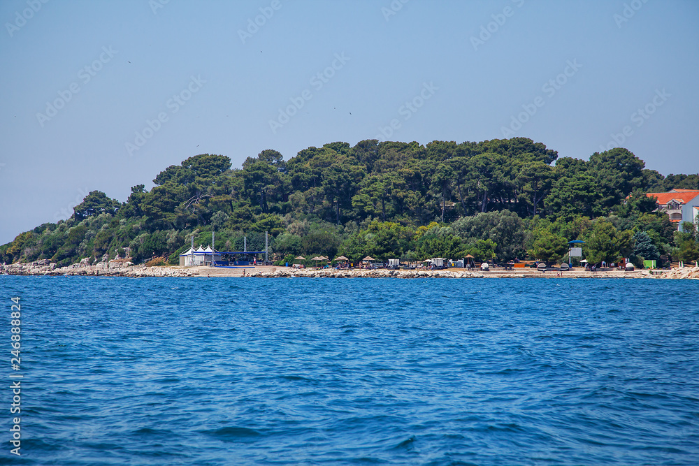 View from the sea on the old historic town of Porec, Croatia.