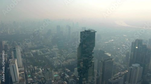 Wallpaper Mural Bangkok central business downtown, heavy traffic aerial view. Top view of hazy Thailand's capital. Big city life, transportation, infrustructure and developing country concept. Torontodigital.ca