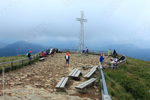 Tarnica 12 July 2018: Cross at Tarnica mountain top. Bieszczady National Park near Wolosate village. Poland photo
