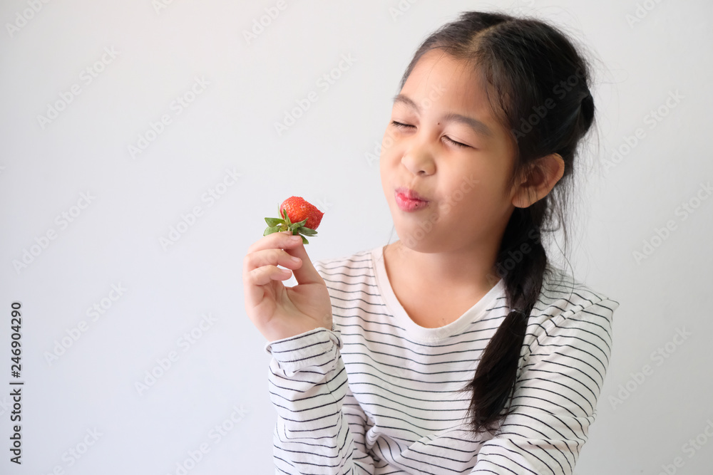 Girls with fresh red strawberries, healthy food Girls with fresh red strawberries, healthy food