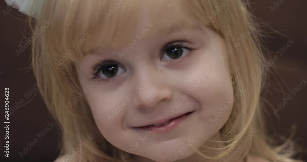 Happy three years old girl. Cute blonde child. Brown eyes. Cute girl smiling. Pretty little child, 3-4 year old blonde girl Happy three years old girl. Cute blonde child. Brown eyes. Cute girl smiling. Pretty little child, 3-4 year old blonde girl