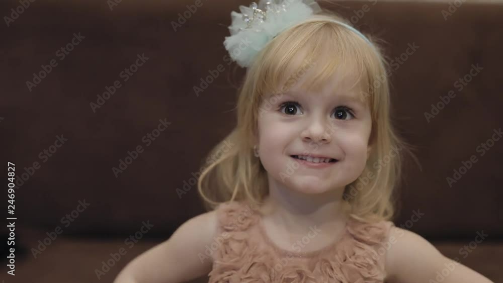 Happy three years old girl. Cute blonde child. Brown eyes. Cute girl smiling. Pretty little child, 3-4 year old blonde girl. Make faces Happy three years old girl. Cute blonde child. Brown eyes. Cute girl smiling. Pretty little child, 3-4 year old blonde girl. Make faces
