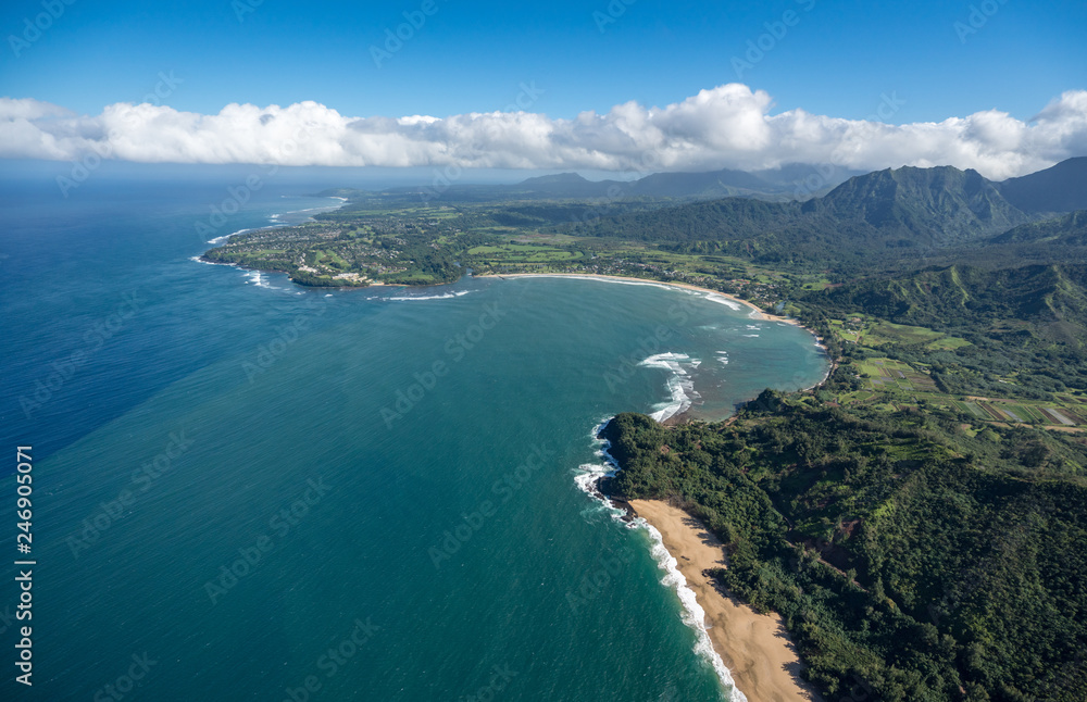 Aerial view of Hanalei Bay and Lumaha'i beach on hawaiian island of Kauai from helicopter flight Aerial view of Hanalei Bay and Lumaha'i beach on hawaiian island of Kauai from helicopter flight