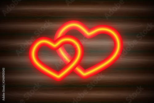 on a dark wooden background two neon red glowing volumetric hearts for Valentine's Day