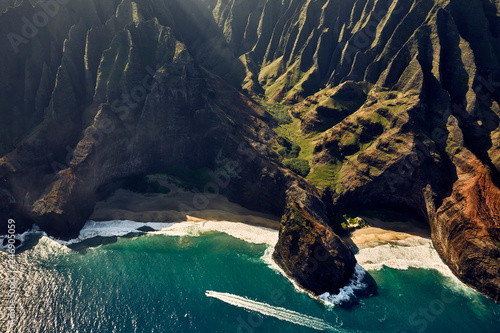 Aerial view of speedboat moving in cove, Hawaii © Christopher