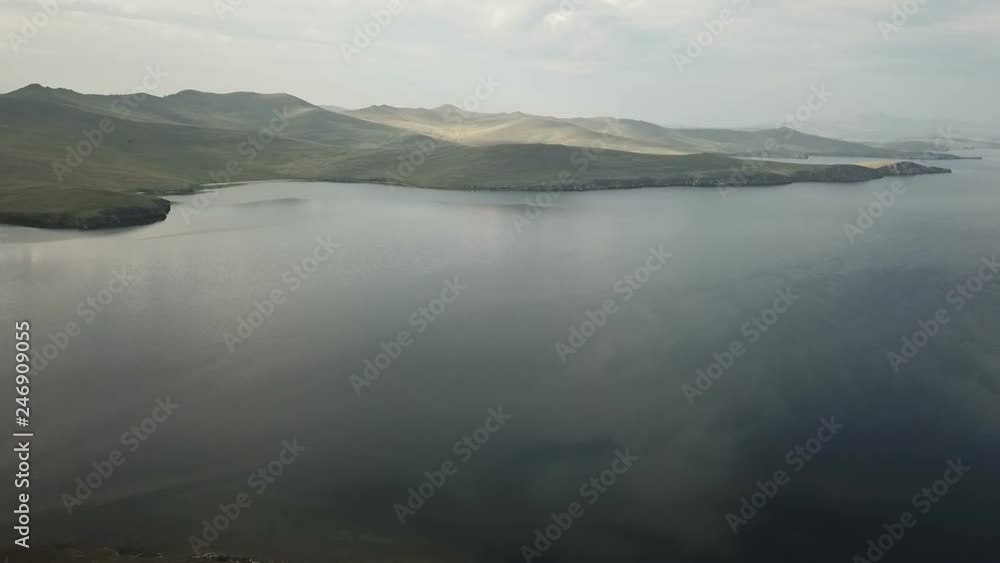 Aerial view of sand beach and crystal clean water of Baikal Lake. Aerial view of sand beach and crystal clean water of Baikal Lake.