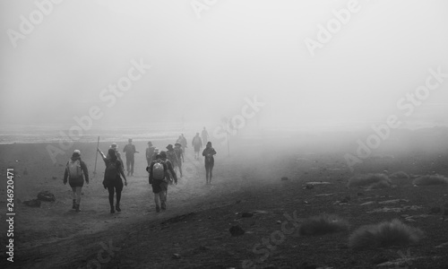 people walking on fog