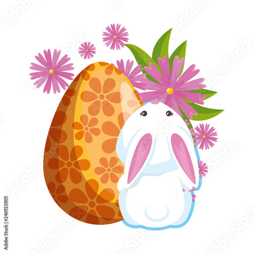 cute rabbit with easter egg painted and flowers