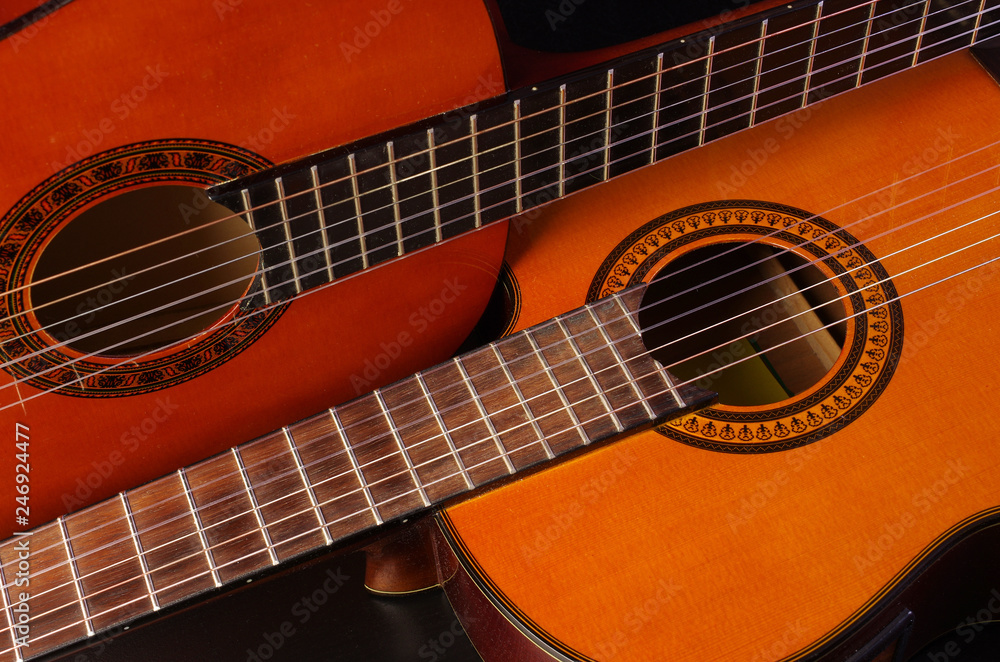Obraz premium Two acoustic guitars. Close-up