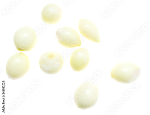 Peeled onions on a white background