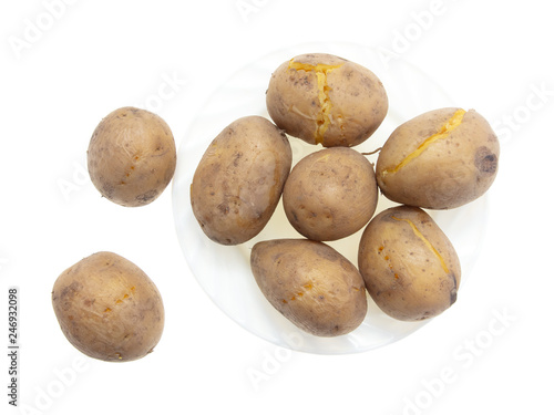 Boiled potatoes in a plate isolated on white background