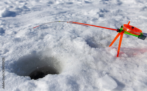 Fishing rod for ice fishing in winter © schankz